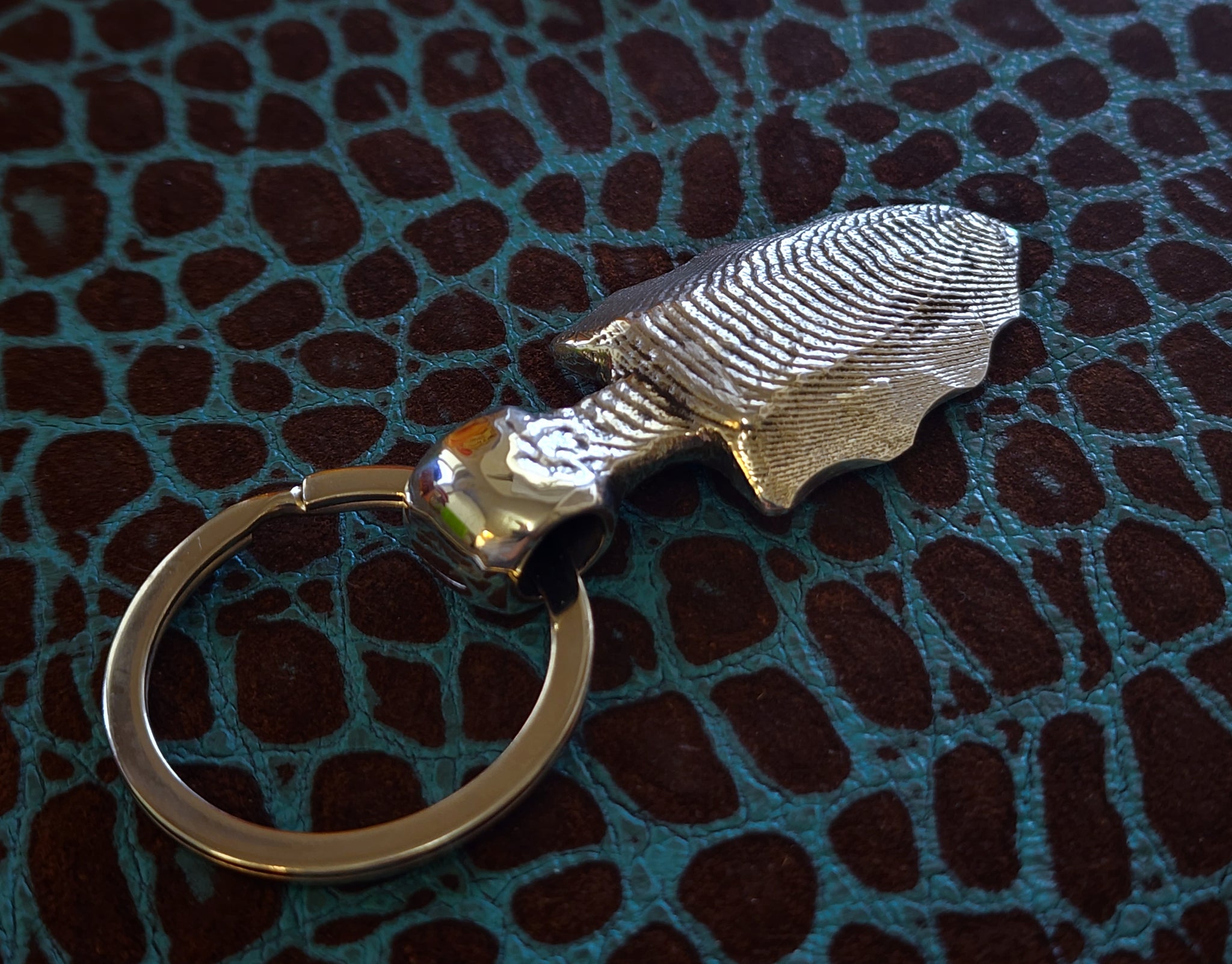 Custom 'Arrowhead' Hand-carved Hand-poured Cuttlefish Cast Pendant Keychain